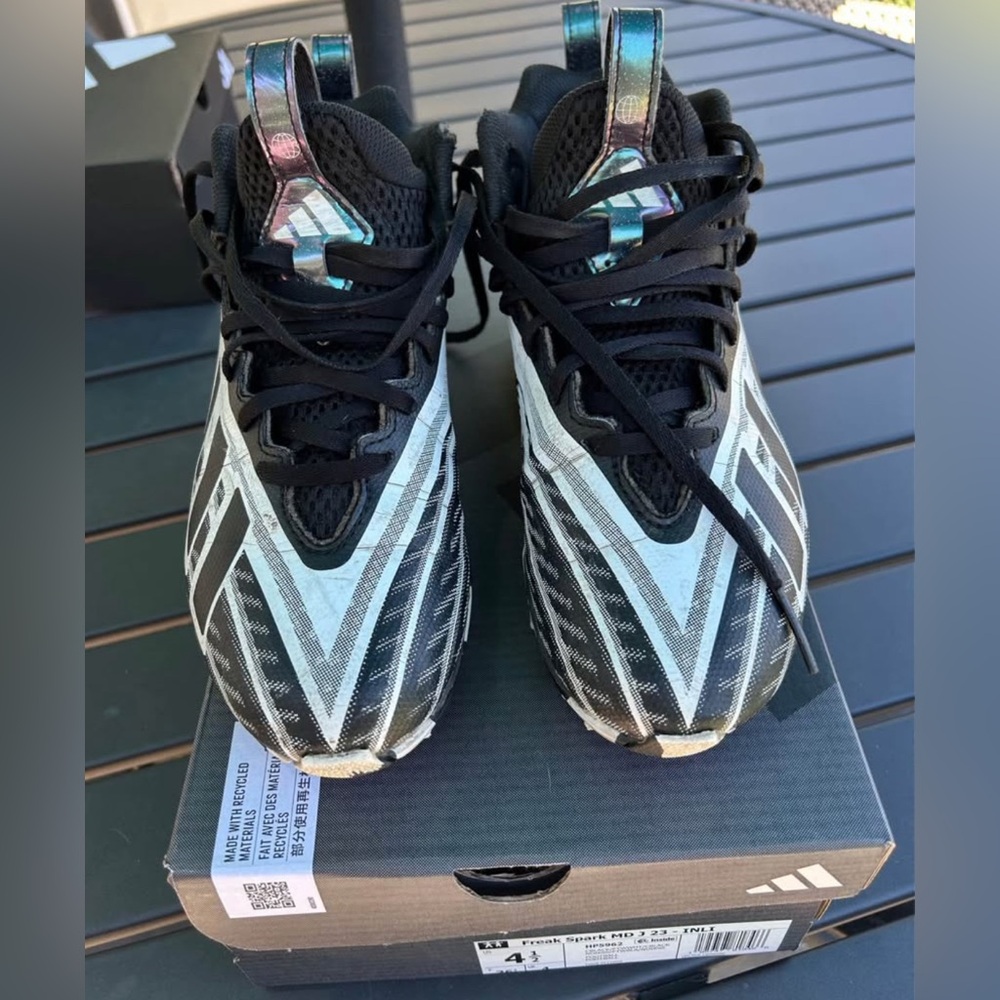Adidas Black and Silver Athletic shoes , Freak Spark MD 23 football cleats.
